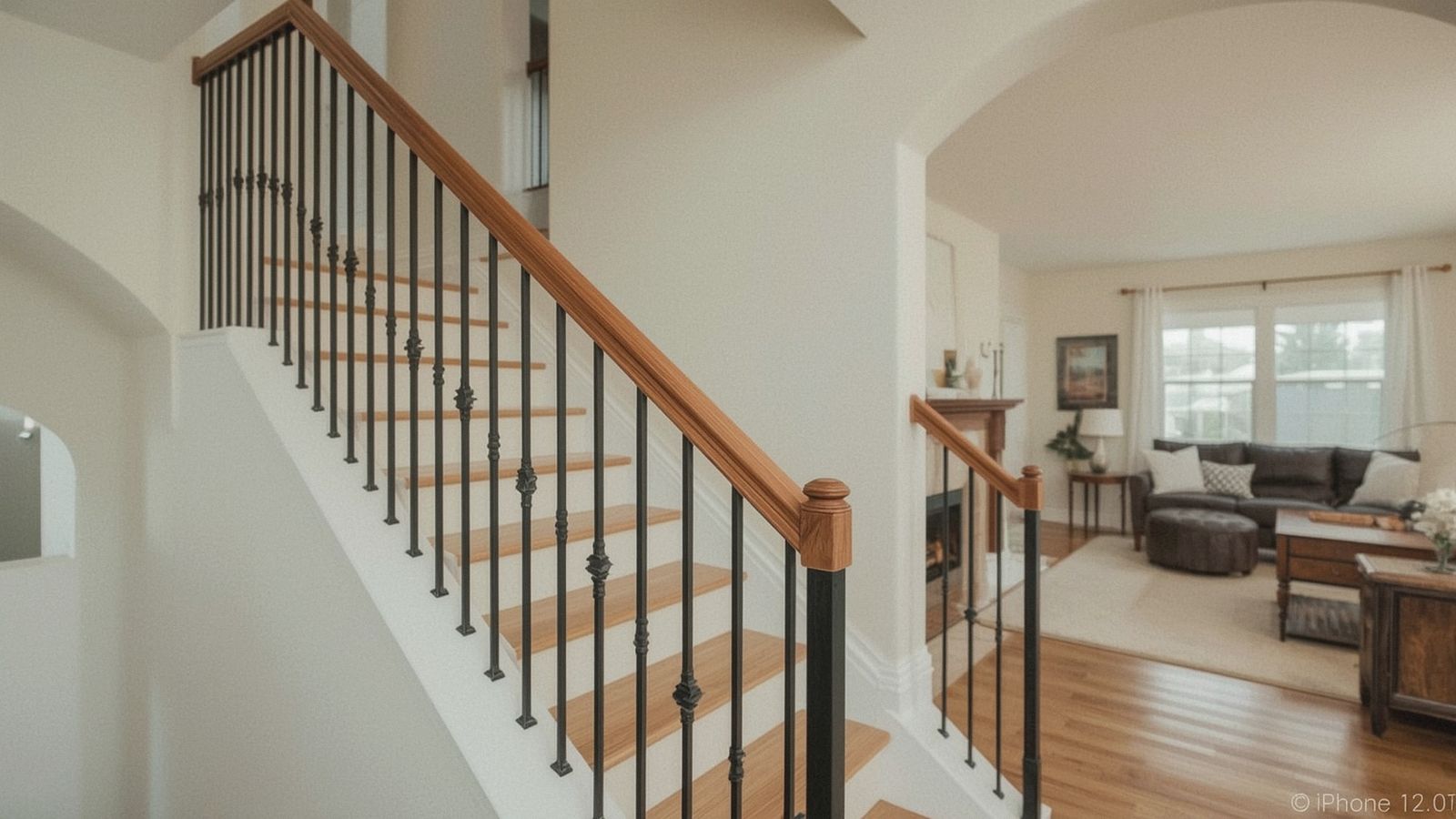Interior stair railing with iron balusters in a San Ramon foyer